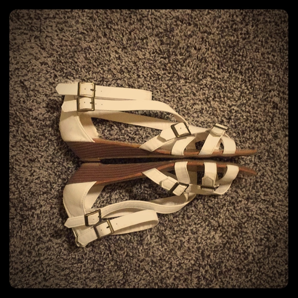White sandal with small wedge heel
